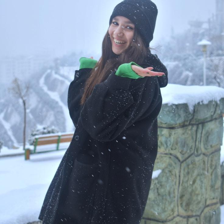 Portrait of Maya Chen, group coordinator and fusion cooking expert